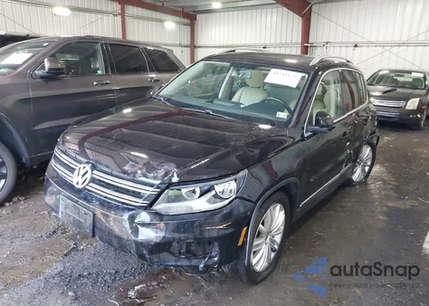2014 Volkswagen Tiguan Sel z USA, uszkodzony, nr VIN WVGBV3AX0EW556316